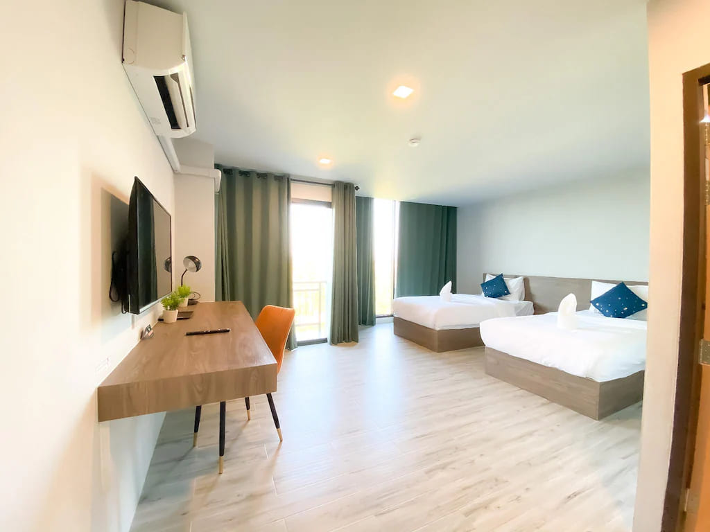 รูปเตียงคู่ของ Dee Hotel Phayao