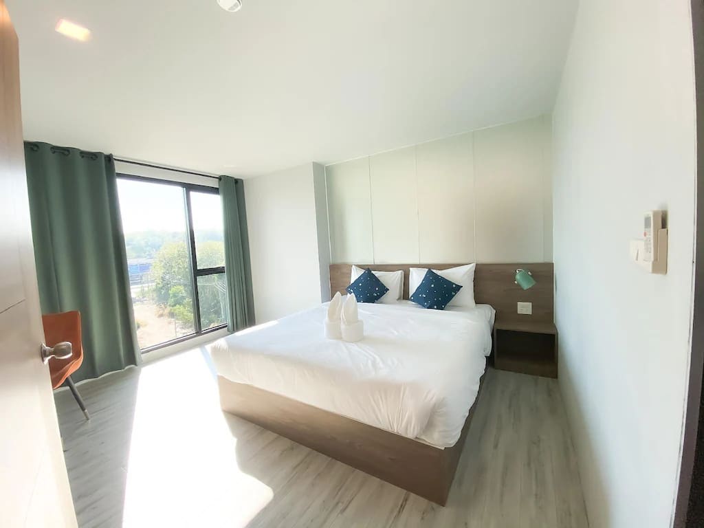 รูปเตียงเดี่ยวของ Dee Hotel Phayao