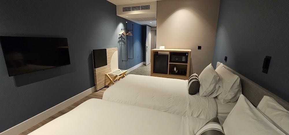 รูปห้องพักในโรงแรมเทรเวลลอดจ์ นิมมาน
